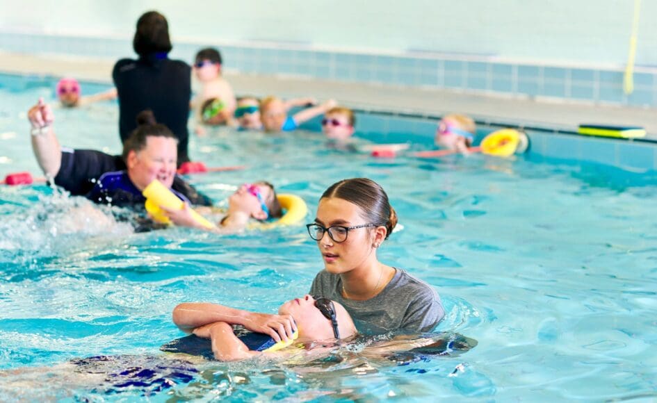 Sport Aberdeen swimming teacher Christie and child